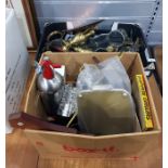 Two boxes of miscellaneous items to include horse brasses, brass candlesticks, further metalware,