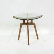 Contemporary designer lamp/coffee table, the circular plate glass top on a beech underframe, 56cm