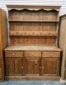 Reproduction pine dresser, the two shelf open plate rack with six small drawers, three frieze