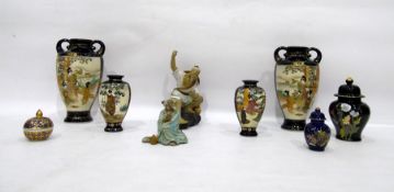 Pair of 20th century Japanese Satsuma vases decorated with female figures in gardens and various