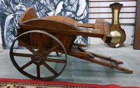 A wooden vintage  dog cart,  60cms in length including the shafts