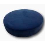 Circular pouffe upholstered in a dark blue fabric, 147cm diameter