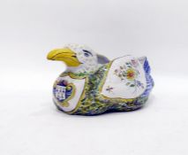 Devres faience seagull-shaped bowl decorated with floral sprays, a Breton crest to chest, marked 'D'