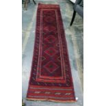 Meshwani wool runner with totem of lozenges in red, blue and ivory, stylised leaf border, 256 x