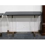 Pair of designer rectangular black glass topped console/side tables on heavy transparent perspex and