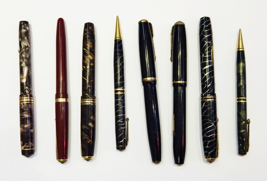 Seven Conway Stewart pens and pencils, including The Conway Stewart Pen, The Conway 22, Conway