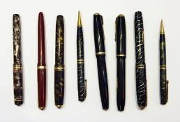 Seven Conway Stewart pens and pencils, including The Conway Stewart Pen, The Conway 22, Conway