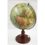 Globe marked James Wellsworth Limited, on wooden base with compass,56cms height approx. and a sea