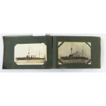 Postcard album containing WWI ship, steamship, regiment and other naval ships and a quantity of