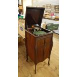 A Britanniaphone - a wind-up gramaphone in fitted cabinet with hinged lid and cupboards below.