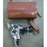Bolex Cine camera in case, together with a small quantity of other camera equipment