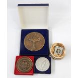 Assorted medals relating to sport, including Metropolitan Eight Oared Challenge Cup medallion, a