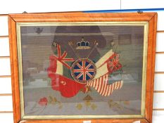 Military sampler inscribed Honi Soit Qui Mal Y Pense, with flags and crown, 43cm x 55cm (framed)