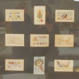 Nine embroidered silk postcards including The Kings Royal Rifle Corps and a floral applique card,