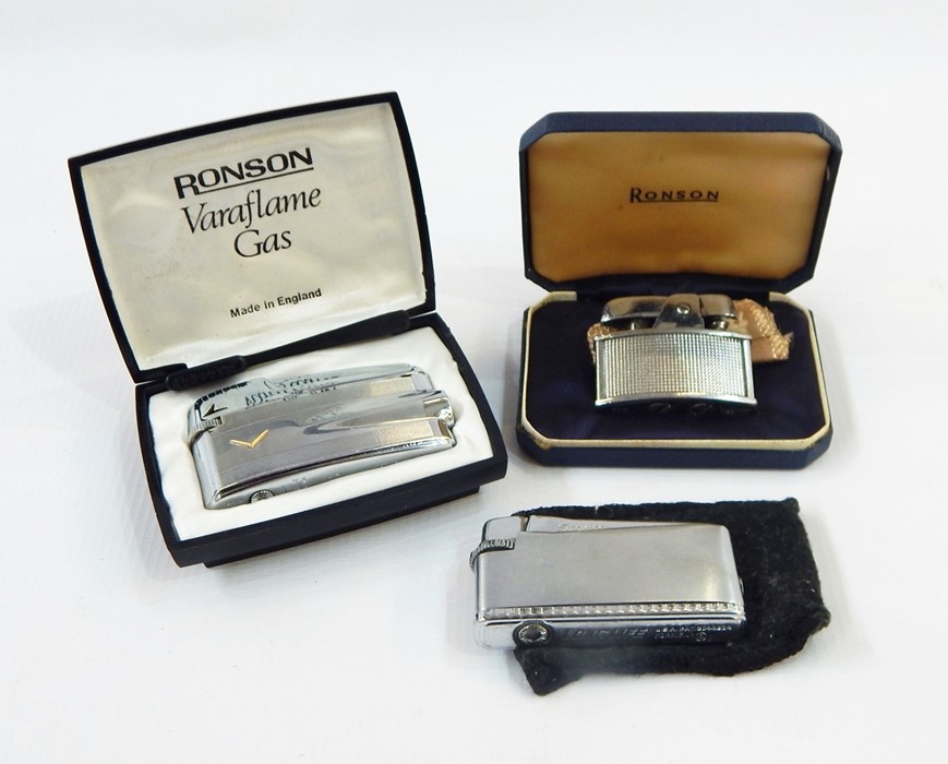 Two Ronson chrome lighters, cased and another American Longlife lighter (3)