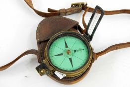 19th century brass-cased compass by Elliot Brothers of London with green-coloured dial, prismatic