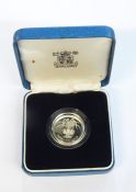 Quantity of silver proof coins ranging from ten pence, one pound, two pound and five pound coins,