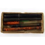 Assorted fountain pens including one marked 'Universal No.370 Lever Pen' by Conway & Stewart,