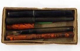 Assorted fountain pens including one marked 'Universal No.370 Lever Pen' by Conway & Stewart,