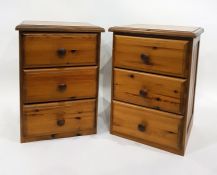 Two 20th century pine bedside chests of three drawers (2)