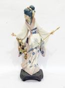 Lladro standing figure of a geisha with parasol and flowering branch, on integral square base,