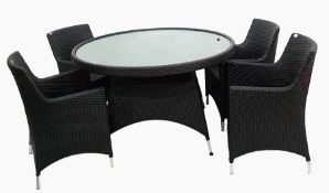 Modern circular glass-topped garden table on a plastic woven base, 130cm diameter and four