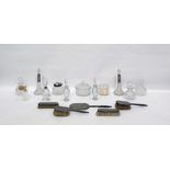 Five-piece silver-backed dressing table set comprising hand mirror and two pairs of brushes, all