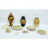 Shorter pottery fish service viz:- two graduated fish-shaped dishes, matching sauce boat and stand