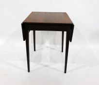 Mahogany drop-leaf table and a circular top cricket table raised upon three square section