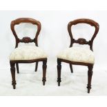 Set of 10 mahogany balloon-back boardroom chairs on turned and carved supports (10)  three of the