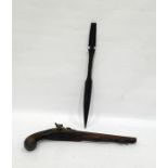 Carved hardwood short spear, the terminal carved as a head and a percussion cap pistol with walnut