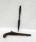 Carved hardwood short spear, the terminal carved as a head and a percussion cap pistol with walnut