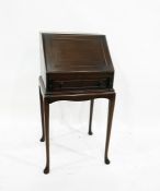 Reproduction lady’s bureau with fall front, on cabriole supports