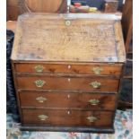 Late 18th century oak bureau, the fall revealing t