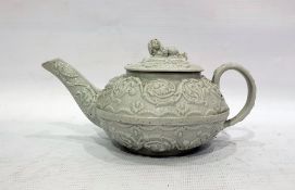 Early 19th century Wedgwood teapot, the grey glazed body with raised scrolling decoration and with