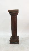 Oak pedestal in form of Corinthian column