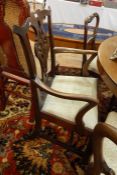 Antique mahogany carver's Chippendale-style open armchair with scroll top rail, pierced scroll