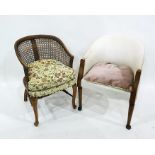 Wicker tub chair and a stained wood tub armchair on pad feet (2)