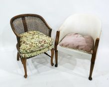 Wicker tub chair and a stained wood tub armchair on pad feet (2)