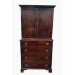 19th century mahogany chest on chest with moulded pediment, two cupboard doors raised upon a base of