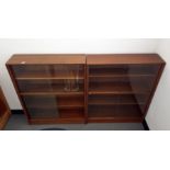 Two teak shelving units with sliding glass doors and one further similar (3)