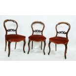 Set of six Victorian balloon-back dining chairs with red upholstered overstuffed seats, to