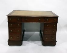 Victorian mahogany kneehole pedestal desk, having three frieze drawers and an arrangement of six