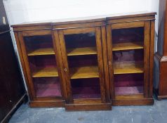 19th century walnut breakfront display cabinet having three cupboards, each with two shelves