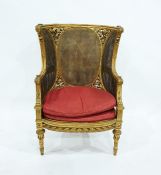 19th century French style Bergere double caned wing armchair, the top rail with ribband, beaded