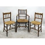 Hardwood spindle-back open arm elbow chair with rush seat and two matching single chairs (3)