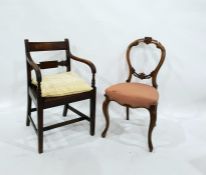 19th century mahogany carver’s open armchair having channelled shoulder rail, scroll carved and