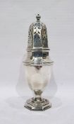 Silver caster by S W Smith & Co, Birmingham 1910, of panelled baluster form with pierced cover, 20cm