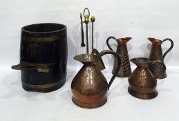 Quantity of brassware to include companion set, graduated copper jugs, coopered barrel, coal