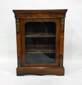 Victorian figured walnut display cabinet, having scroll and foliate inlaid cavetto frieze, fitted